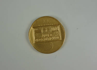Überprägte 5-Mark-Münze mit Motiv vom Checkpoint Charlie